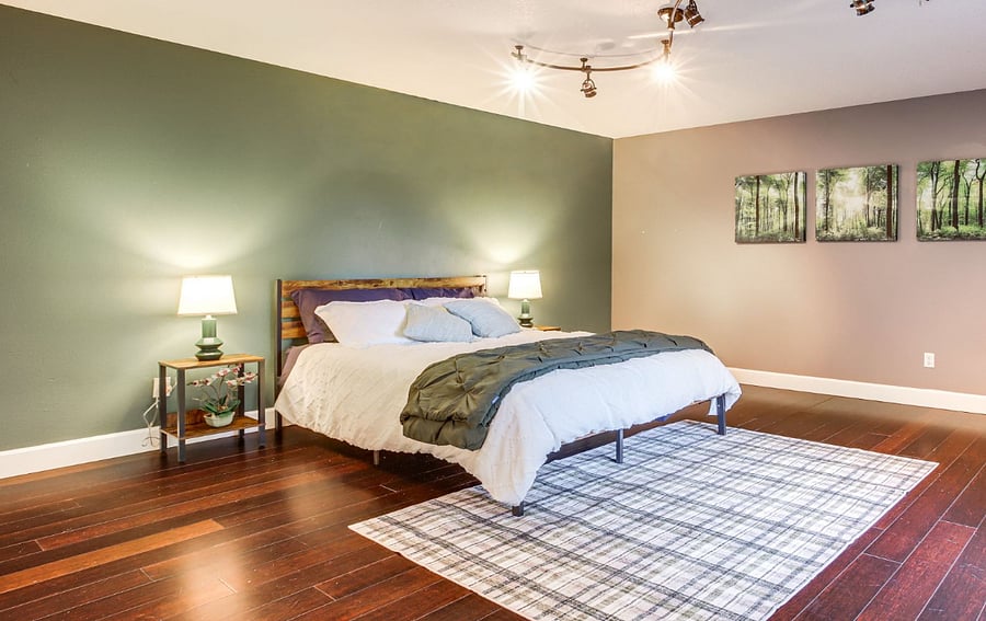 Guest bedroom with large picture window to outside and large closet space. Rooms come with extra space heaters for colder days. Heat is controlled by the owner.  Heat is kept at 72 degrees.
