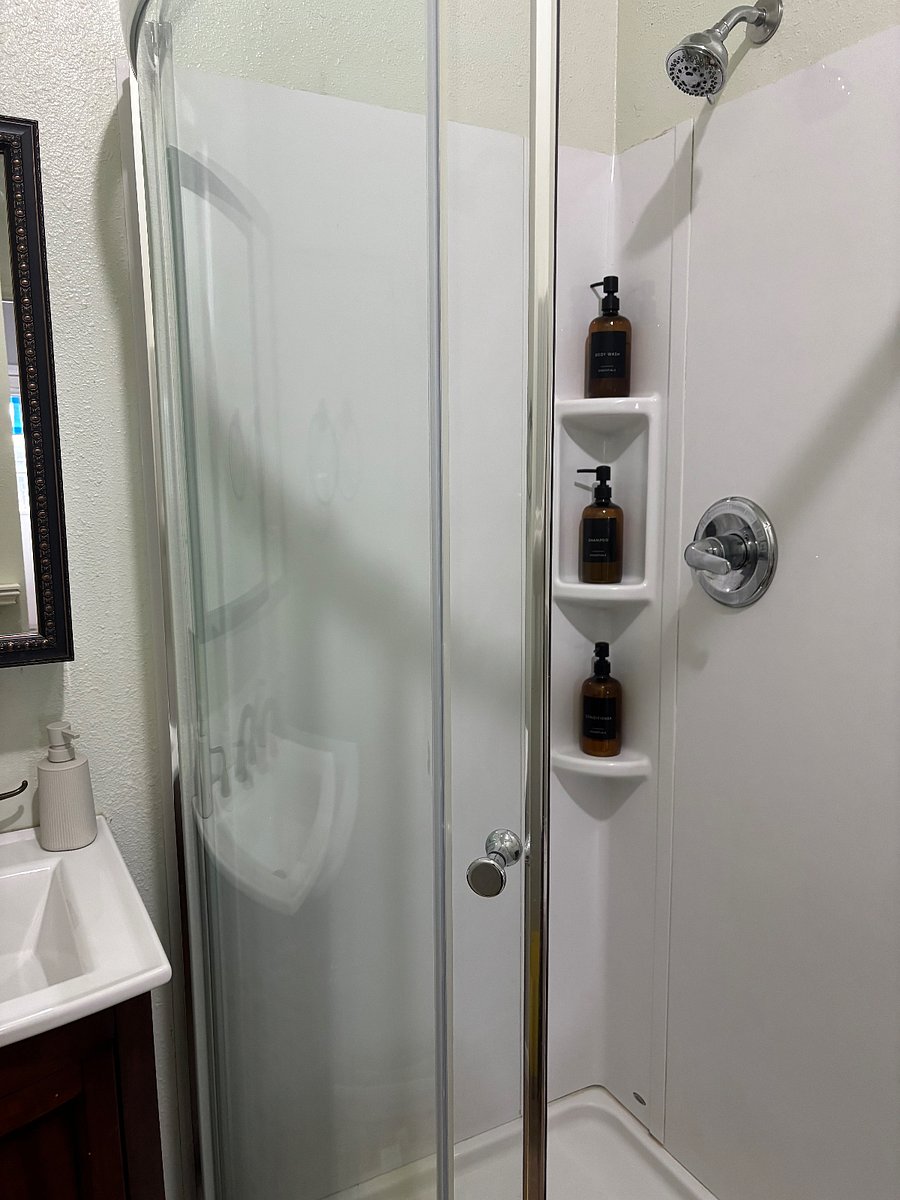 Enclosed shower in bathroom 