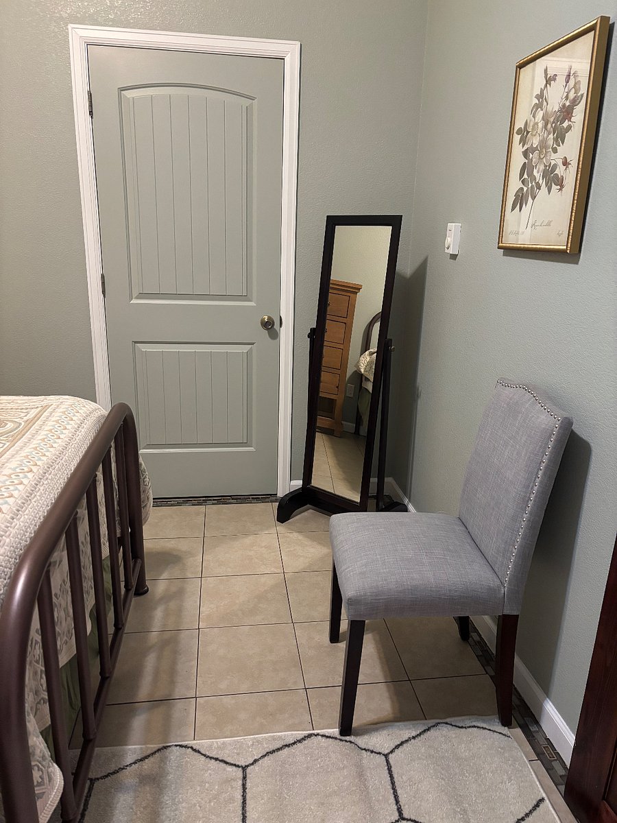 Door to walk-in closet and laundry