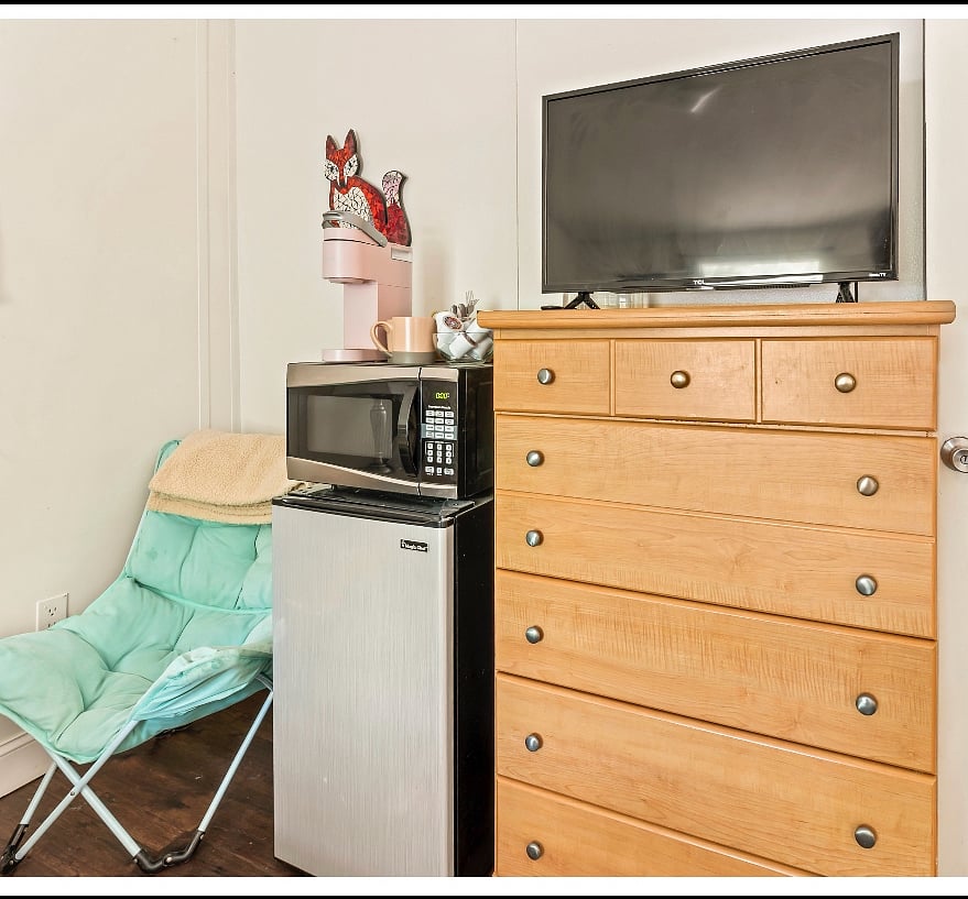 In main bedroom  you have a mini fridge, microwave, Keurig mini coffee maker. 