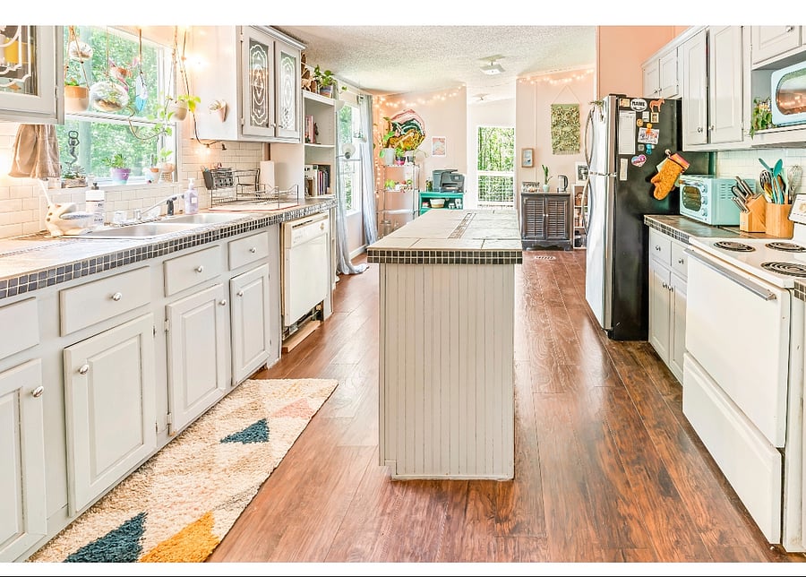 full kitchen access with dishwasher, stove, oven, fridge and freezer space to share with us. All the pots and pans you need! We also have a ninja air fryer and creami! 