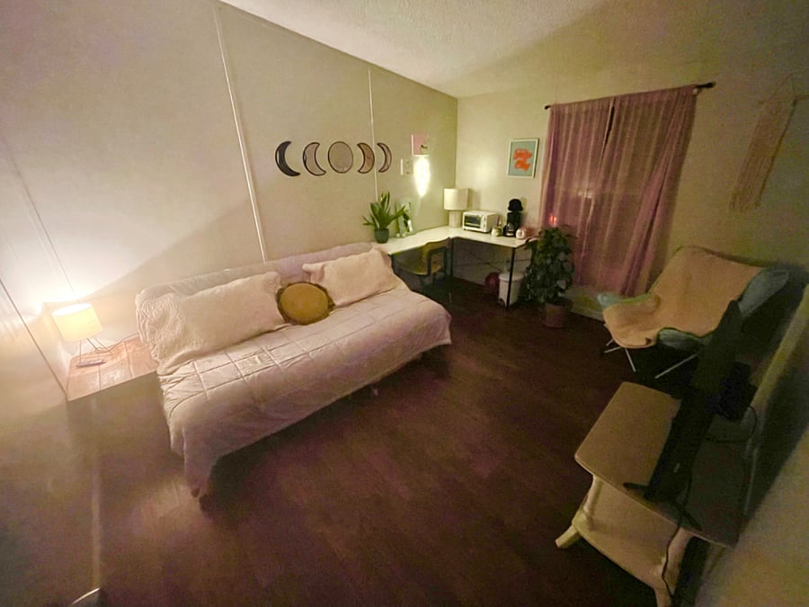 The second bedroom - futon bed, smart tv, desk/work/study area, toaster oven, drip coffee machine, small fan. 