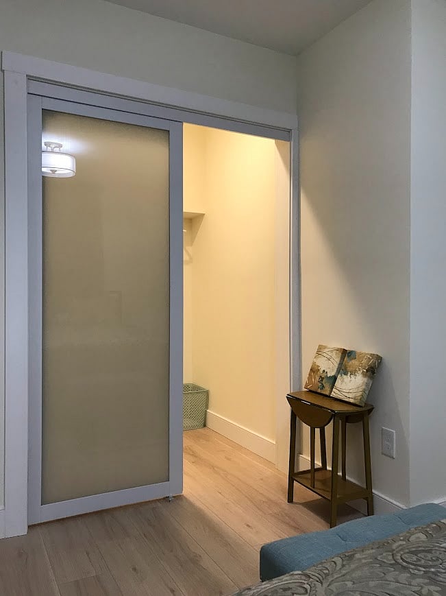 Large lighted bedroom walk in closet