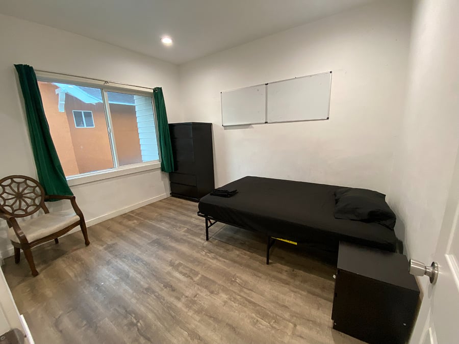 Bedroom with full size bed, dresser, night stand a regular size closet 