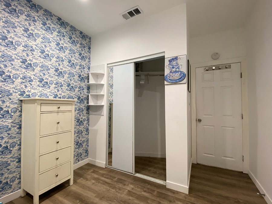 Closet and dresser in master bedroom 