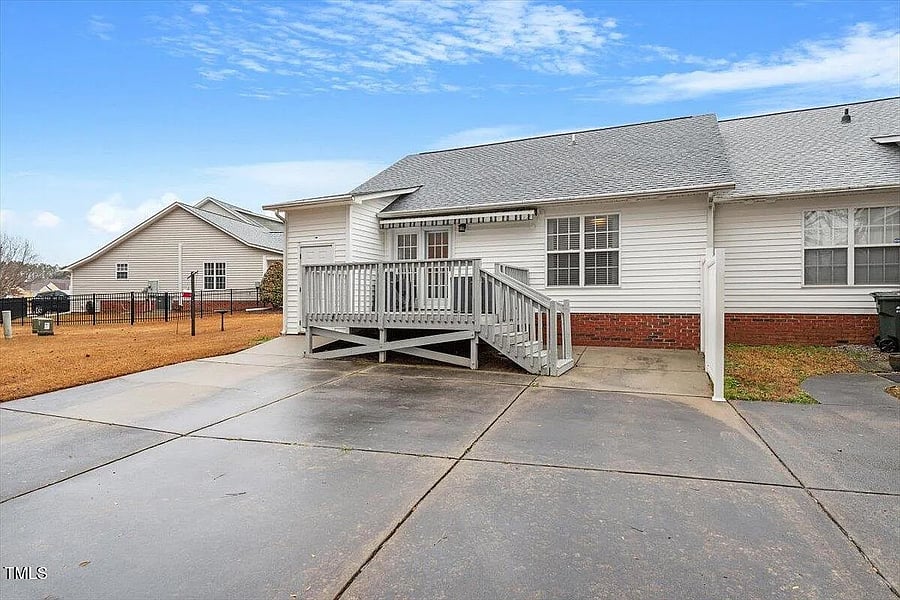 Exterior - rear deck (w retractable awning) & storage room