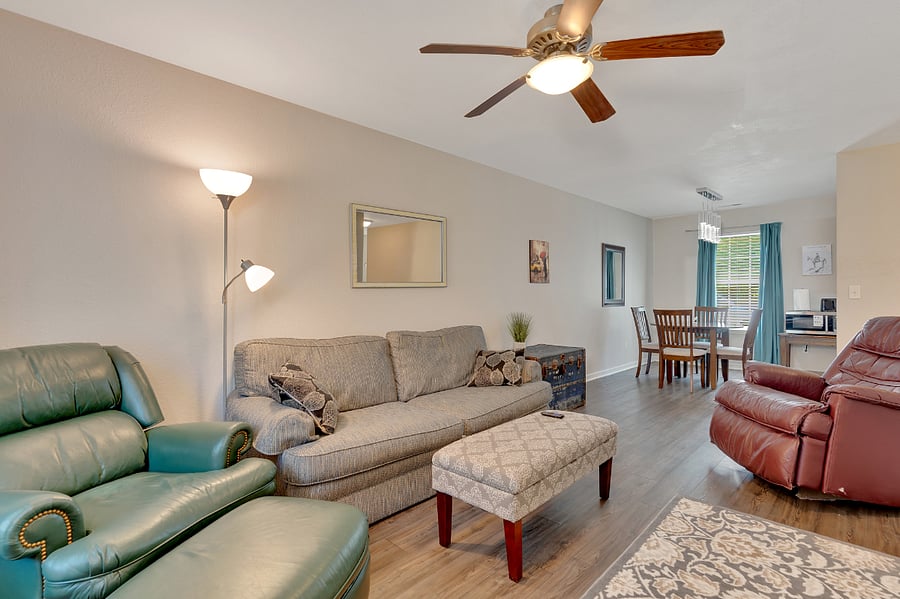 Living room area connects to dining area