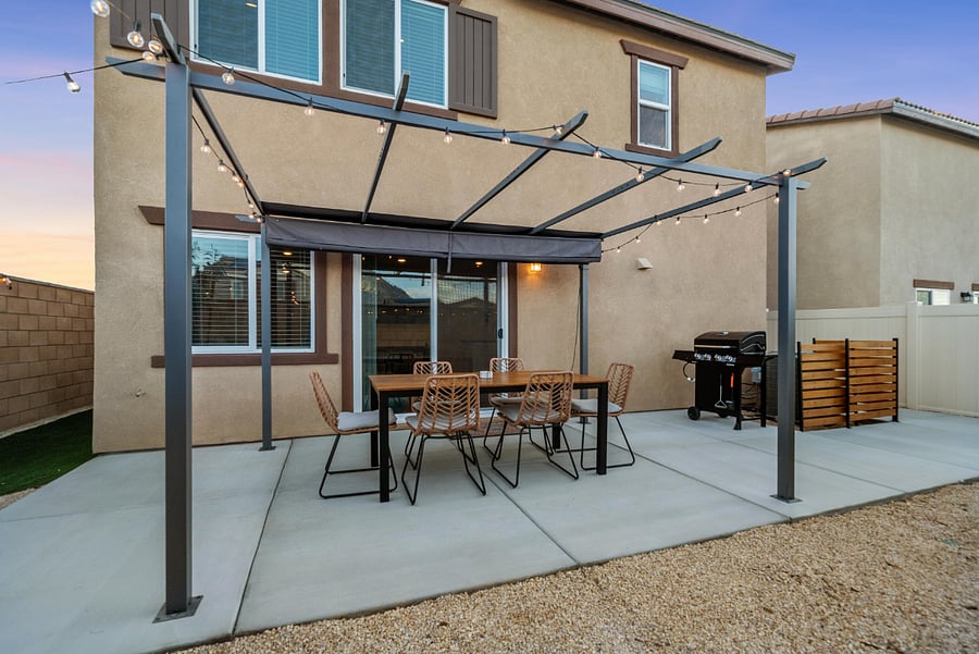 Shared backyard and patio with grill