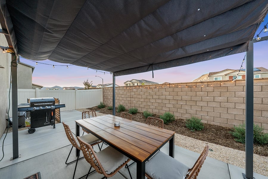 Shared outdoor dining table and grill