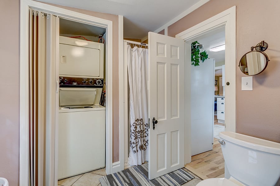 laundry room on main level in the bathroom area.