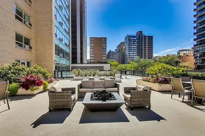 Exterior 2nd floor deck open for grilling, sitting out in sun or evening beverages with friends.2nd foot workout area