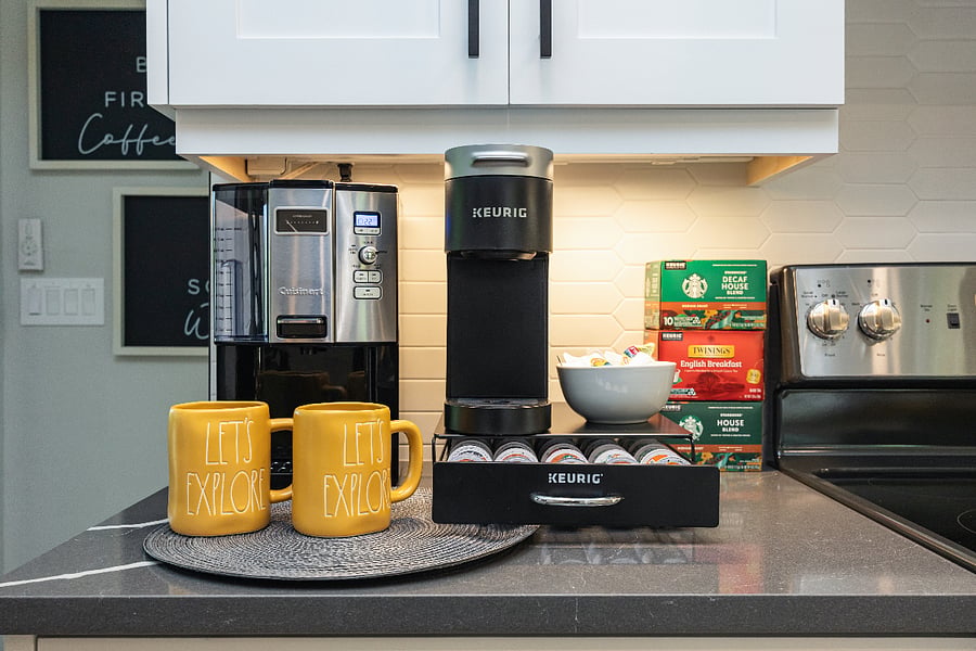 Coffee bar with Keurig and drip coffee maker, mugs, and a variety of pods - regular and decaf coffee plus tea. Morning ready!