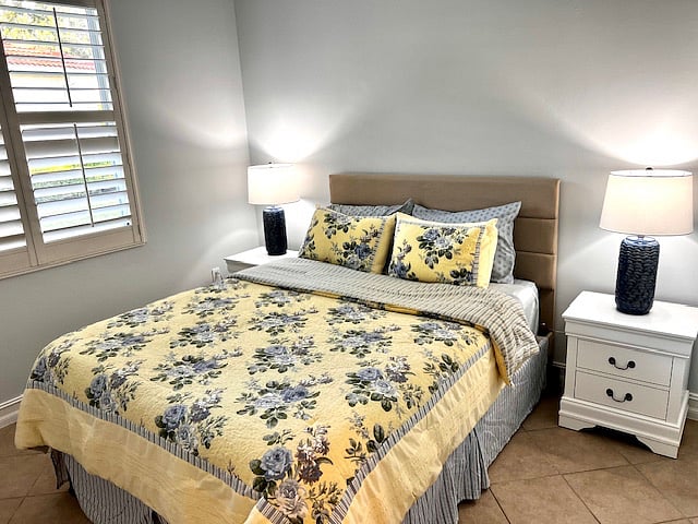 The guest room has a comfortable queen bed, lovely lighting and large closet. Not shown, a 6 drawer dresser, and 2 luggage racks.