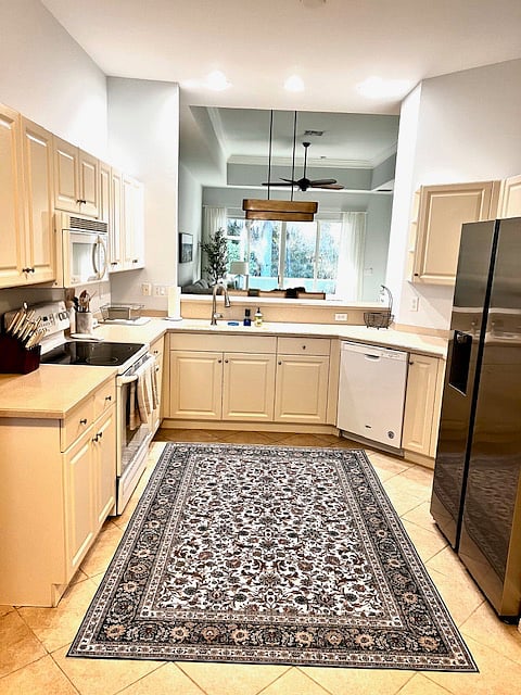 Large fully equipped kitchen with dining nook.