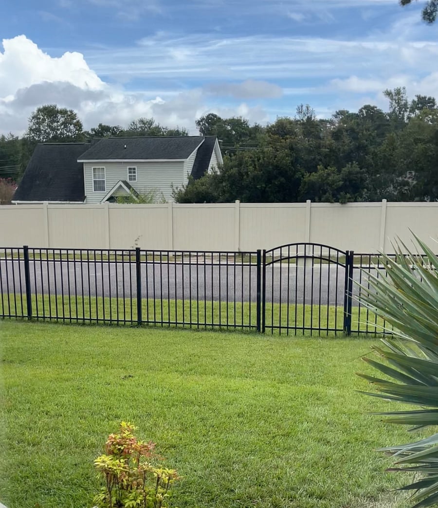 Additional parking all along tall fence for daytime guests or overnight with sticker