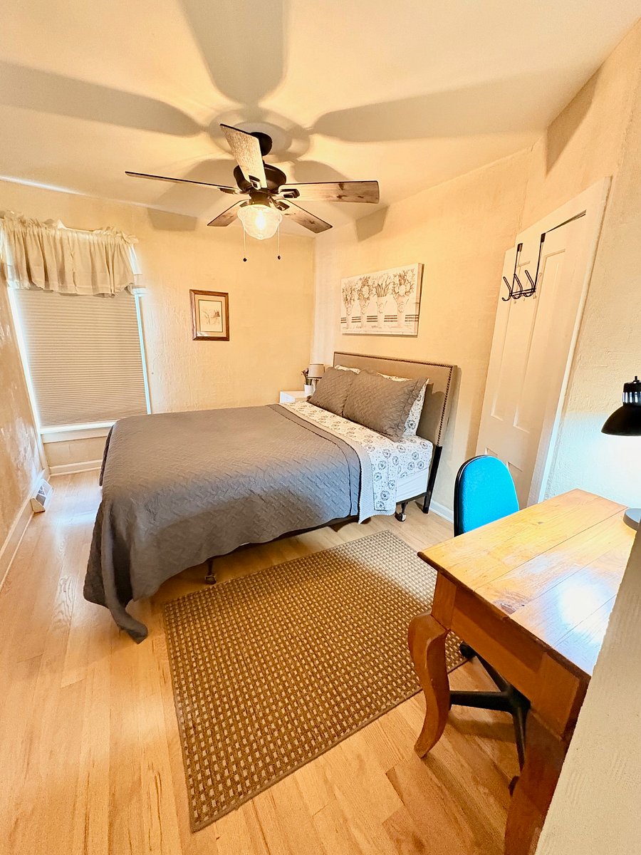 Queen bedroom #3 with walk in closet and desk. 