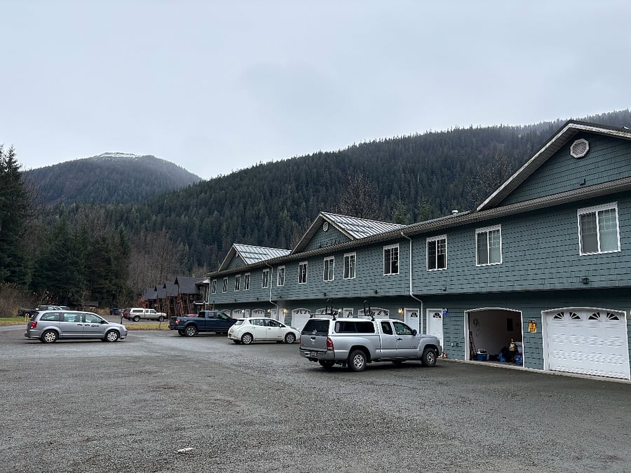 The open garage and door on left (and the Tacoma) is my place.  