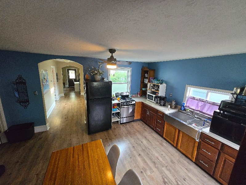 View of the kitchen towards the front of the home (taken from the stairs).