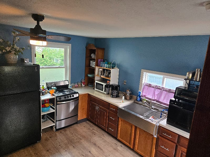 View of the kitchen towards the front of the home (taken from the stairs).