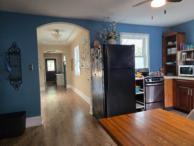 View of first floor hallway from the kitchen dining area. 