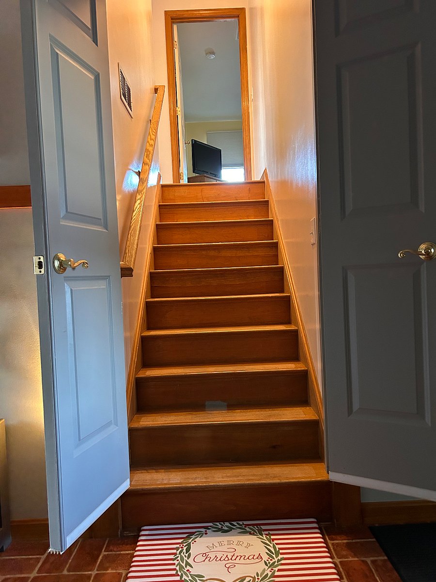 Staircase going up into apt. 