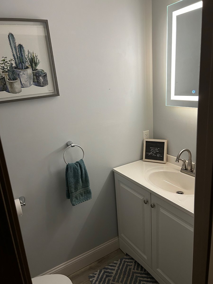 Off kitchen half bath