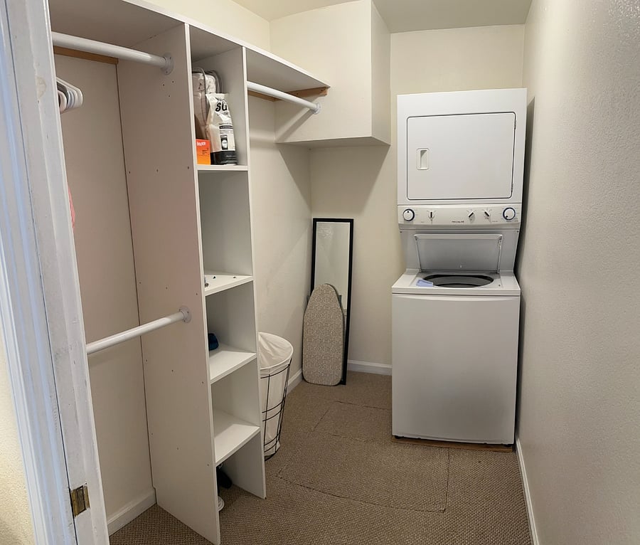 In-unit washer and dryer with extra storage  a valuable convenience for long-term guests.