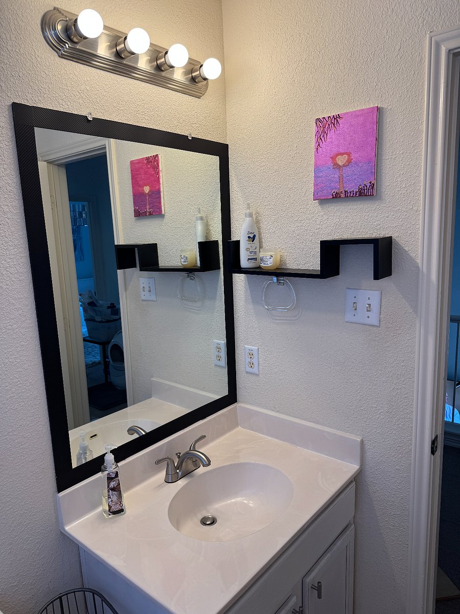 Private vanity and bathroom area kept clean and well-maintained.