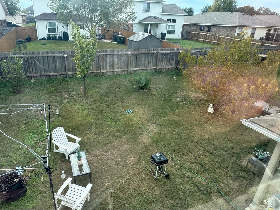 Backyard area available for fresh air and relaxation.