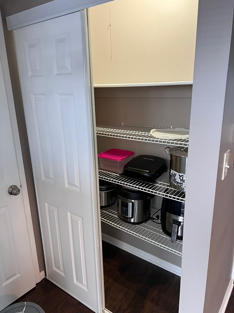 pantry with included cookware