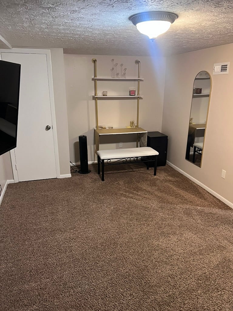 desk area with fan and space heater