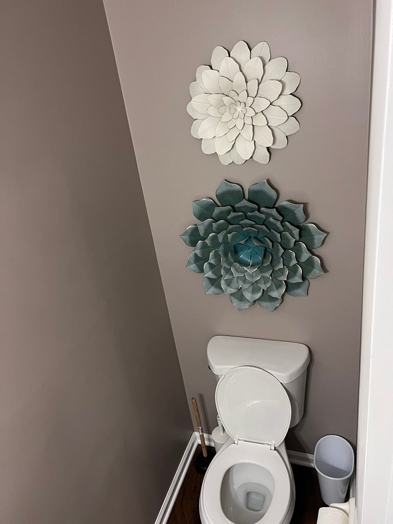 main level bathroom with sink and storage