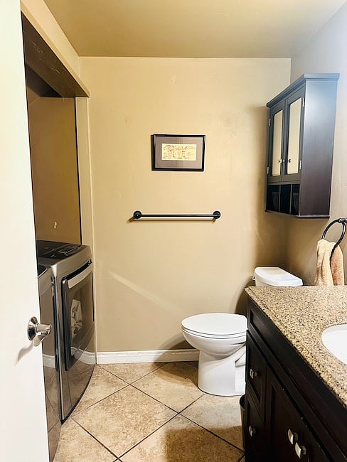 Downstairs Bathroom with Washer and Dryer