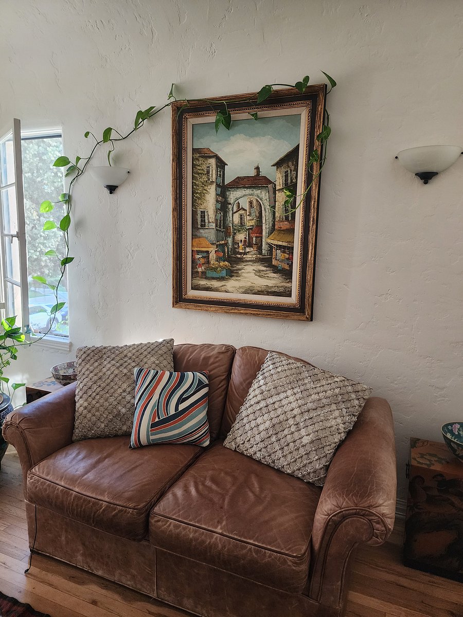 The original J. Lombard oil on canvas painting "Parisian Street"