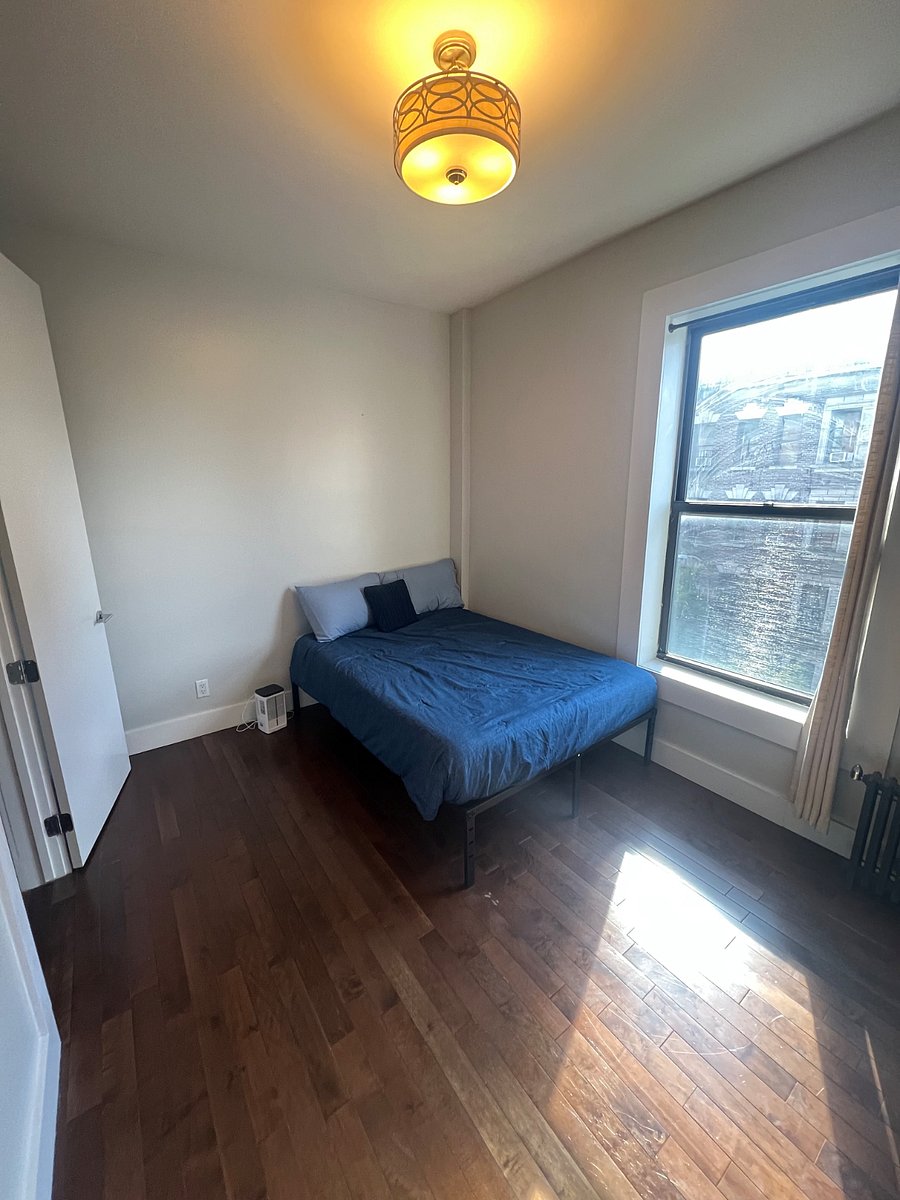 Sublet bedroom. Gets great light and tall ceilings.
