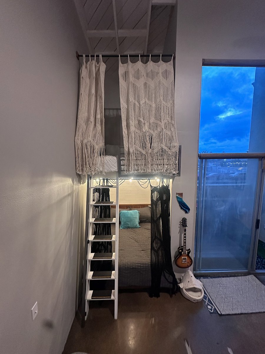 Two beds for additional sleeping. Upper is queen size and lower is full size with bedding for both. 