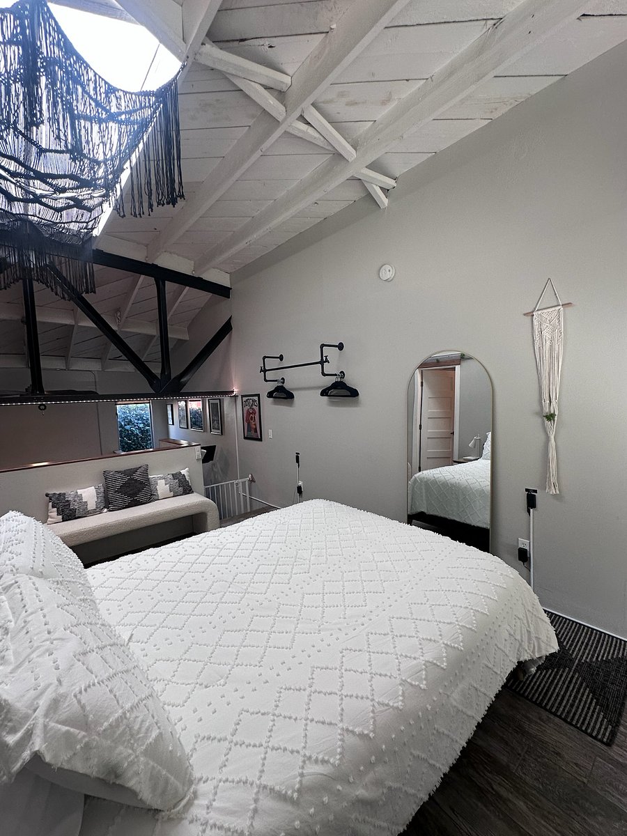 Space for hanging clothing and full size mirror.