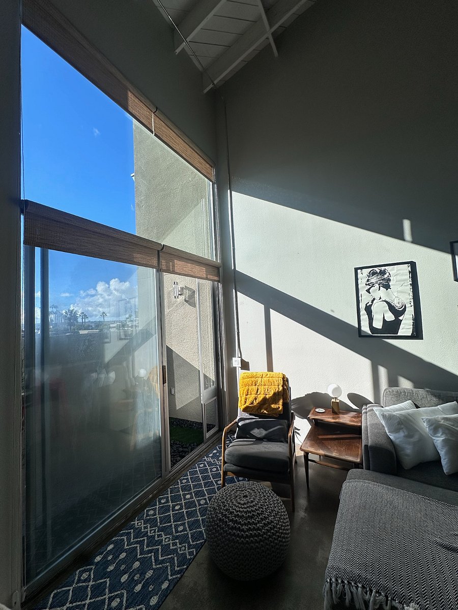 Oversized sliders to access balcony and the bay view