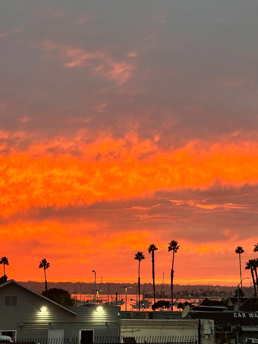 EPIC SUNSETS from our balcony overlooking the bay.