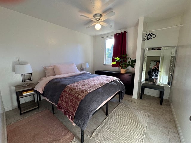 Master bedroom with top quality Queen bed and blackout curtains.