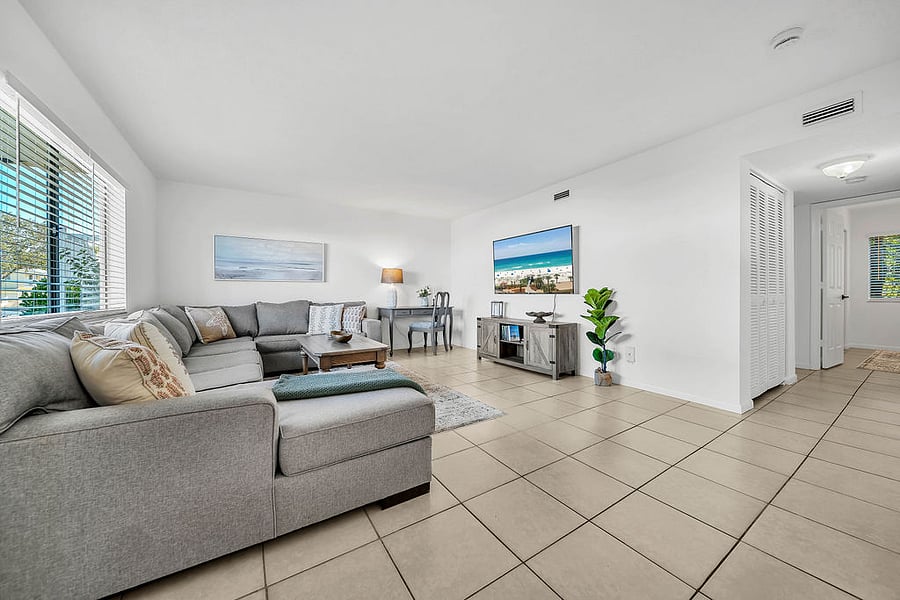 spacious living room with large flat screen TV. YouTube TV installed for cable