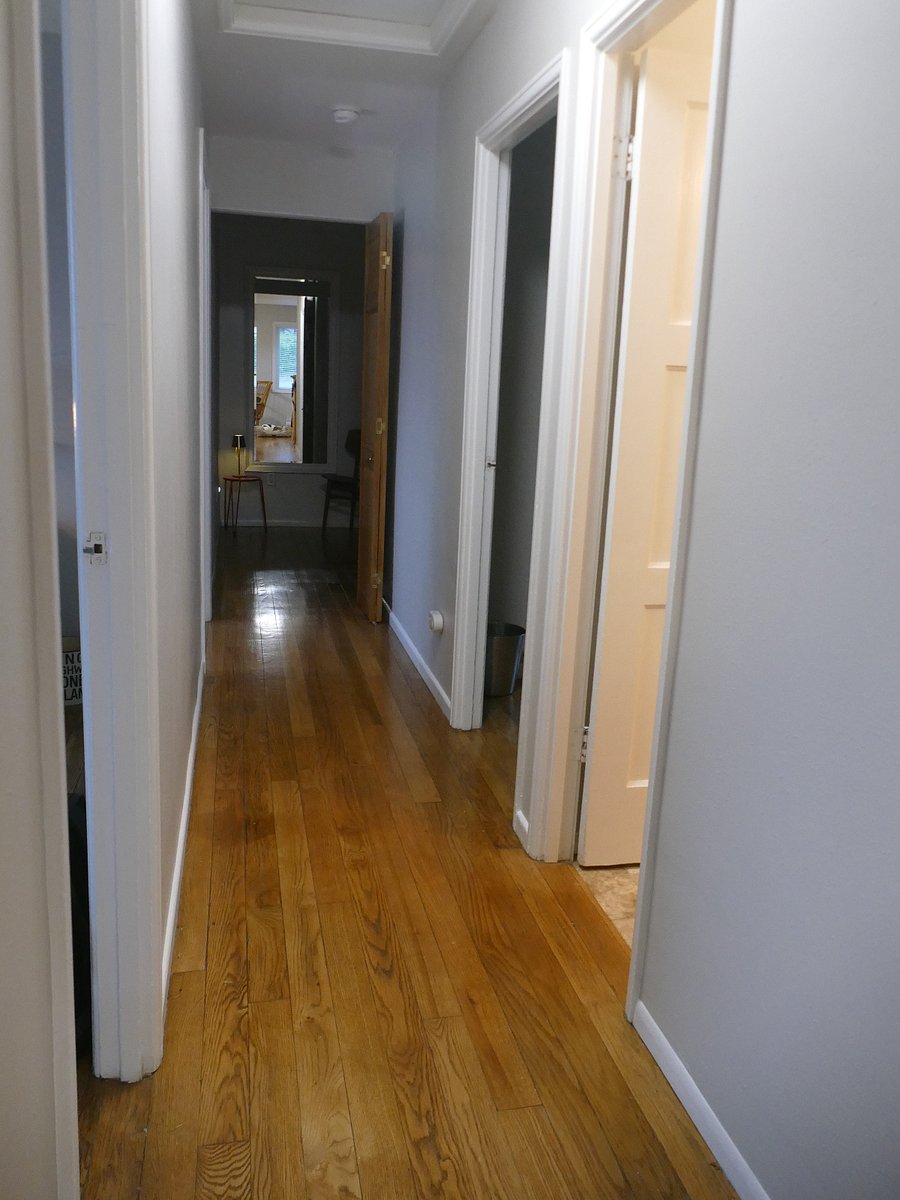 Hallway with Storage Area at the end 