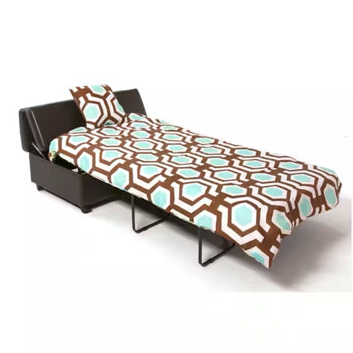 Additional bed folds away into a leather ottoman.