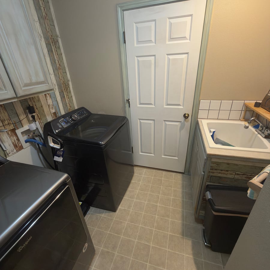 Laundry room washer, dryer, tineco wet dry floor machine. Dyson vacuum in garage. Cleaning supplies under ALL sinks in home!!