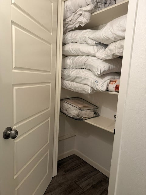upstairs hallway linen closet (ample amount of extra stuff)
