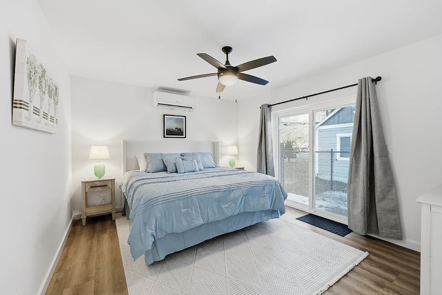 King size bed in bedroom. 