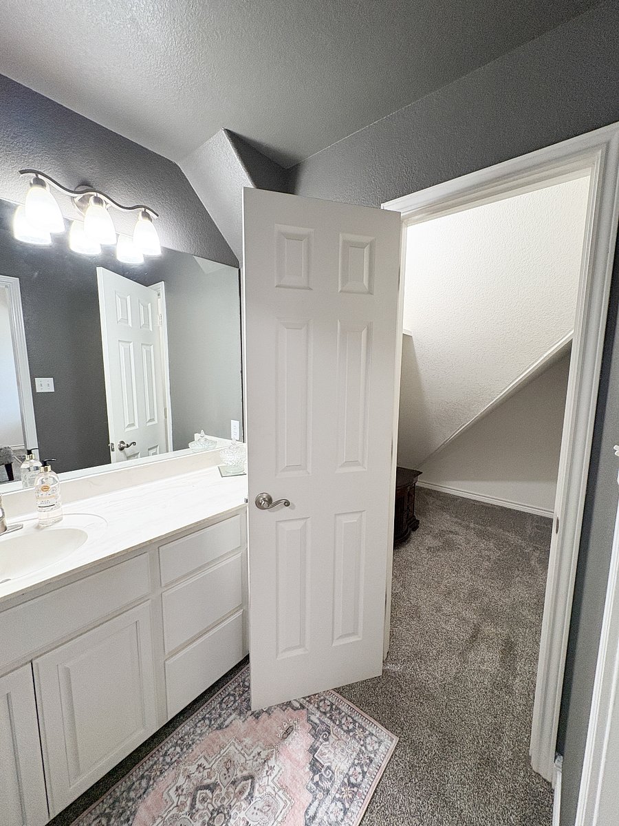 Closet off upstairs bathroom