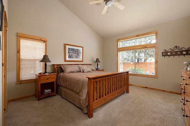 Primary bedroom on first floor with en suite bathroom and walk-in closet