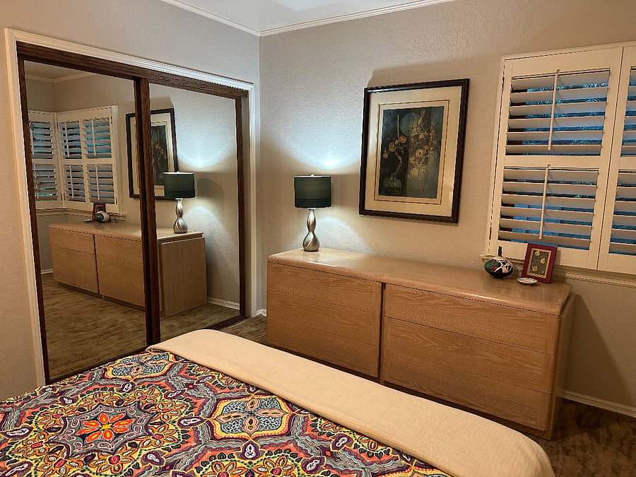 Primary Bedroom with mirrored Closet Doors