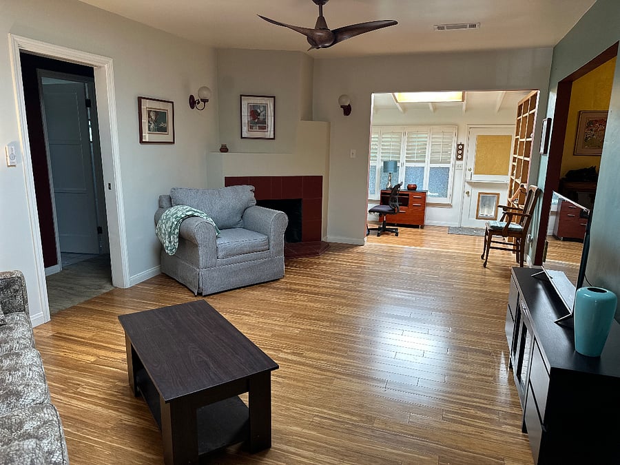 Pocket door on left goes to Bathroom & Bedrooms